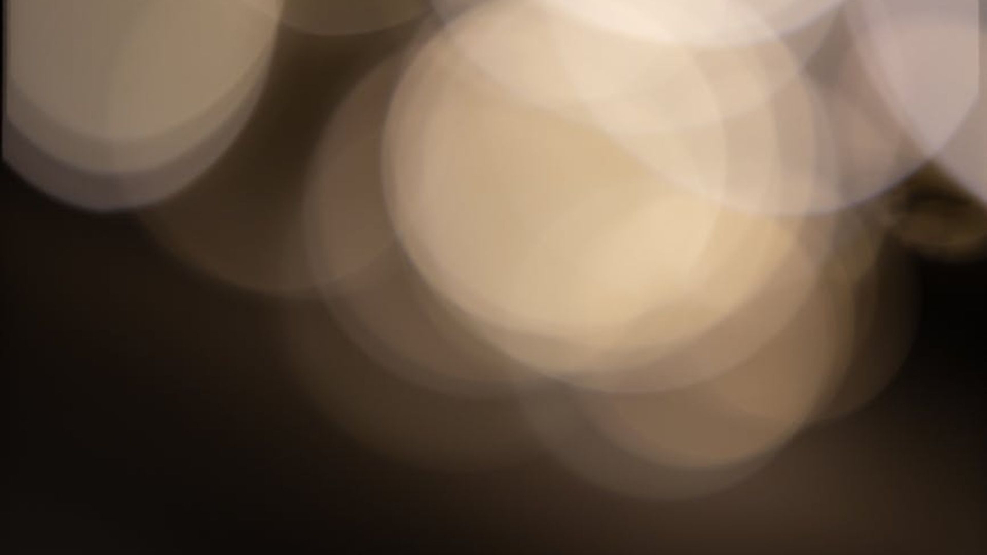 Abstract background with soft focus light trails.